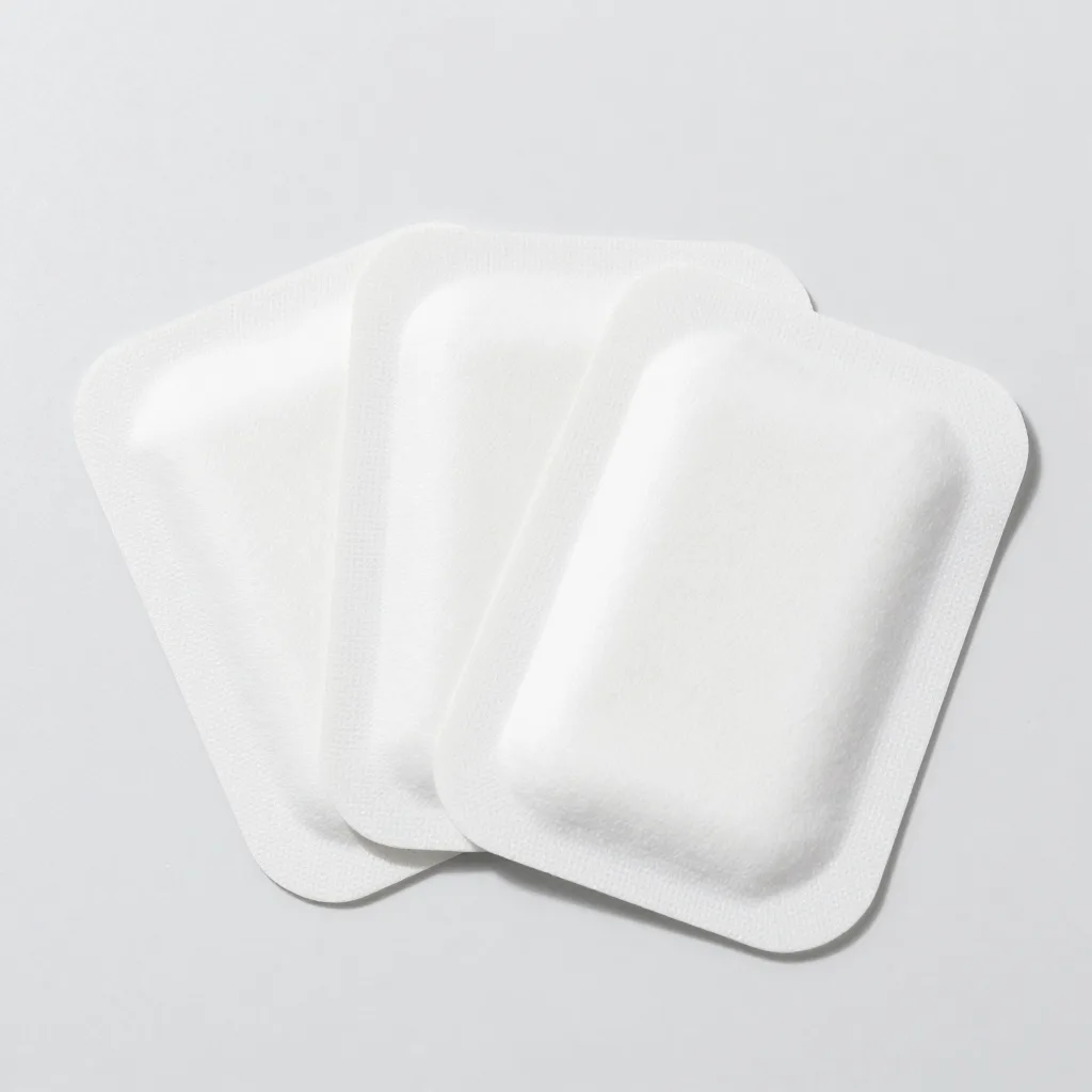 A mix of hydrocolloid patches in different sizes on a light background