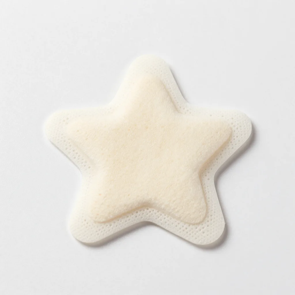 Hydrocolloid patches shaped like stars on a light background